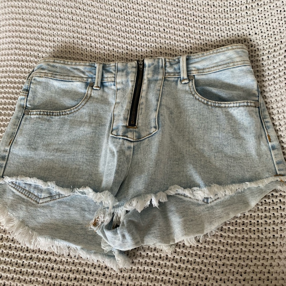 High-rise denim shorts in a light acid wash